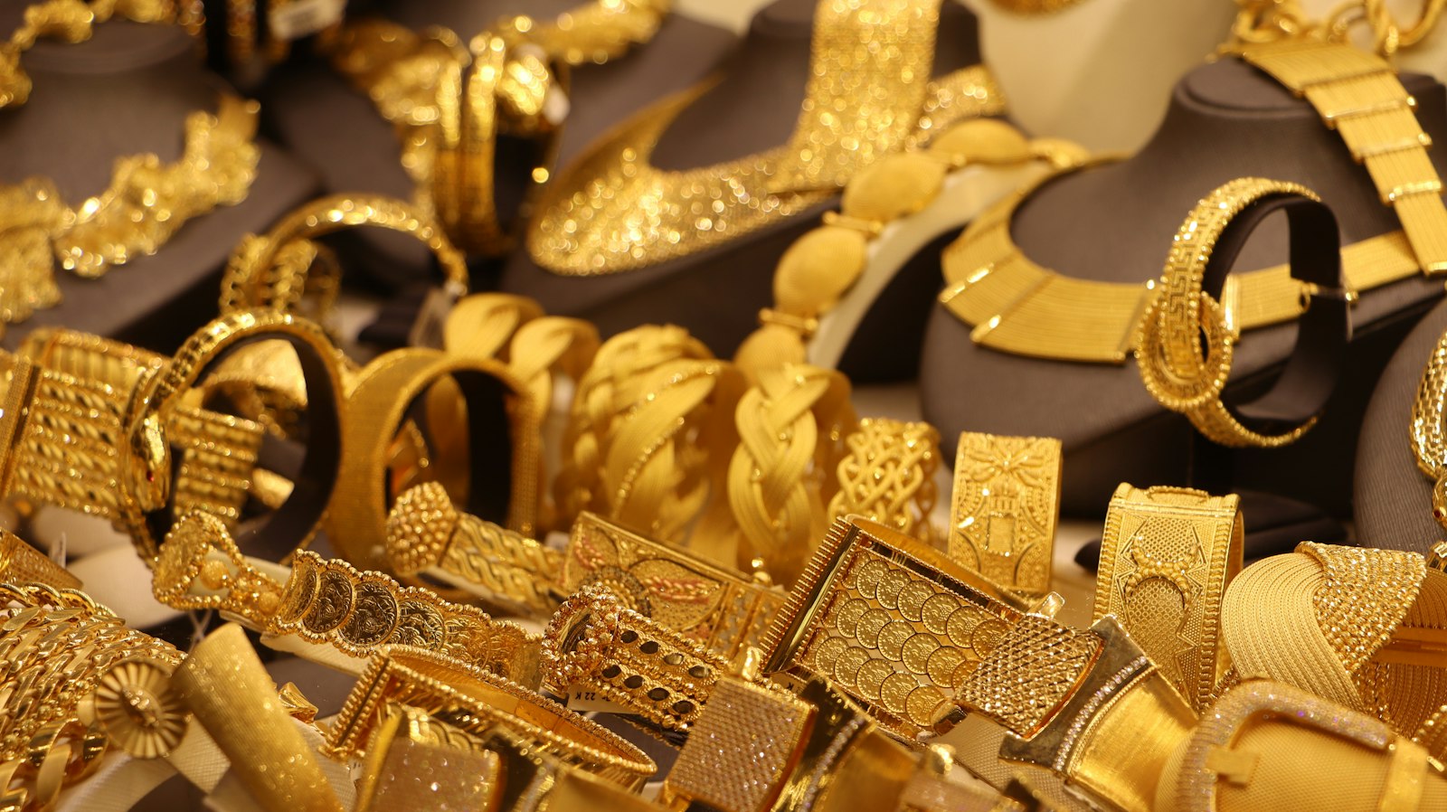 Yellow gold bracelets and necklaces ready for a Hatton Garden valuation